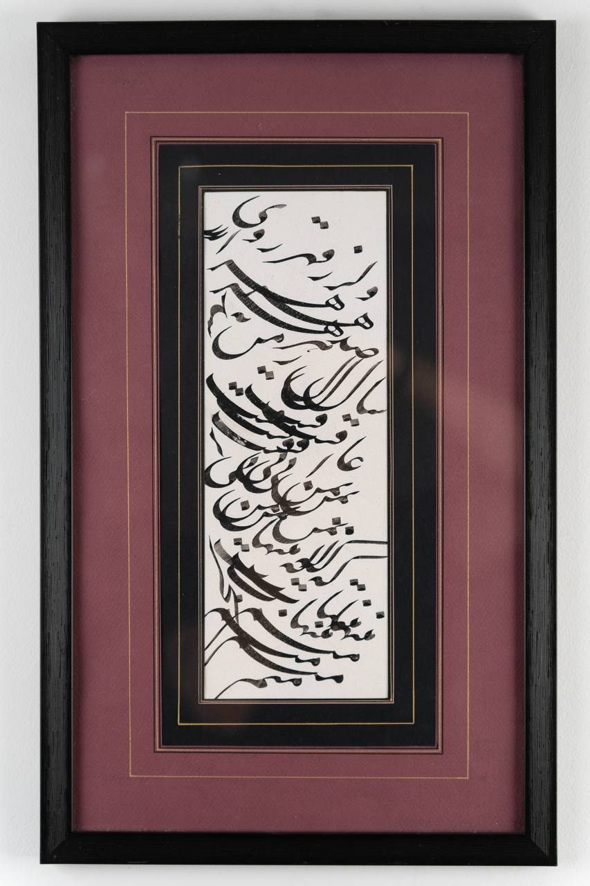 A classical siah-mashq panel in a black frame with a mauve mat